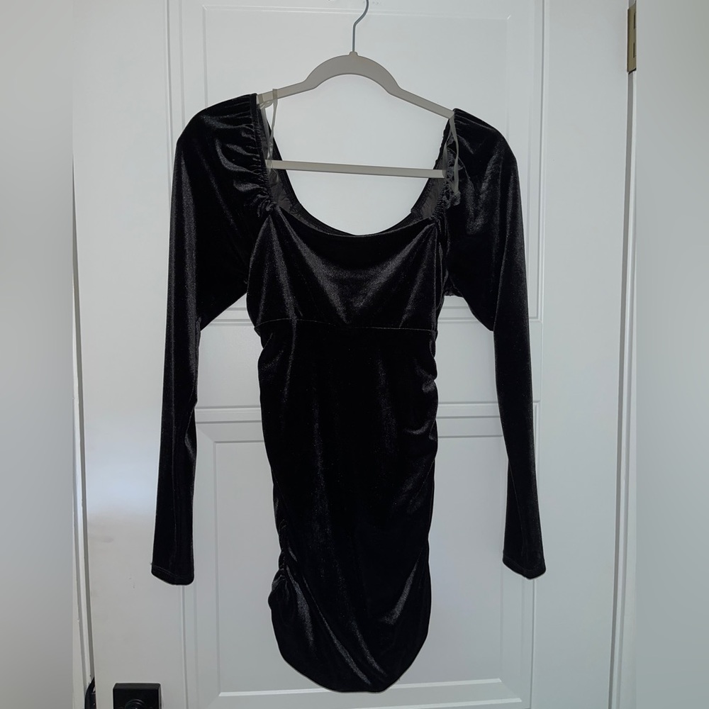 Bodycon velvet long-sleeve dress.